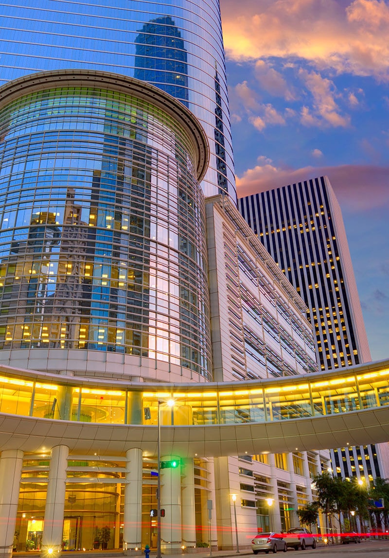 A global-industry city skyline at dusk