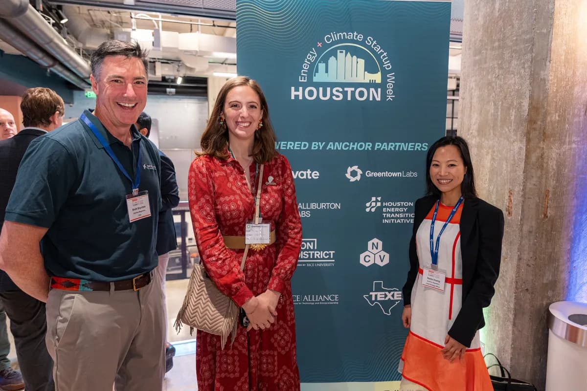 Attendees at the Houston Energy + Climate Startup Week step-and-repeat