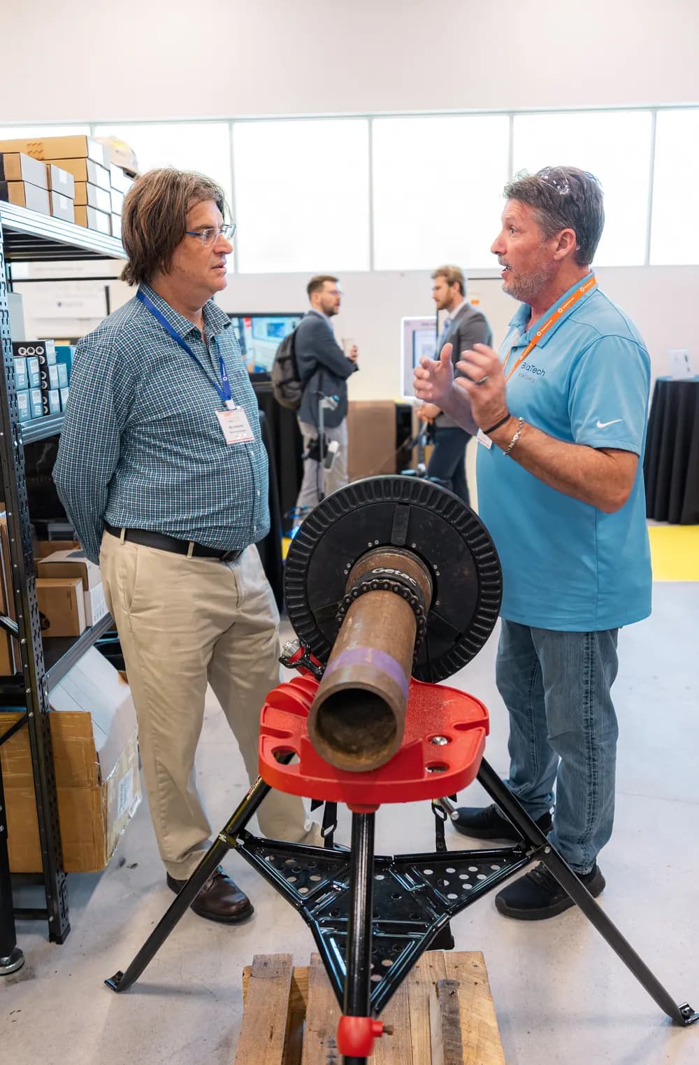Attendees examine hardware on the Open House floor