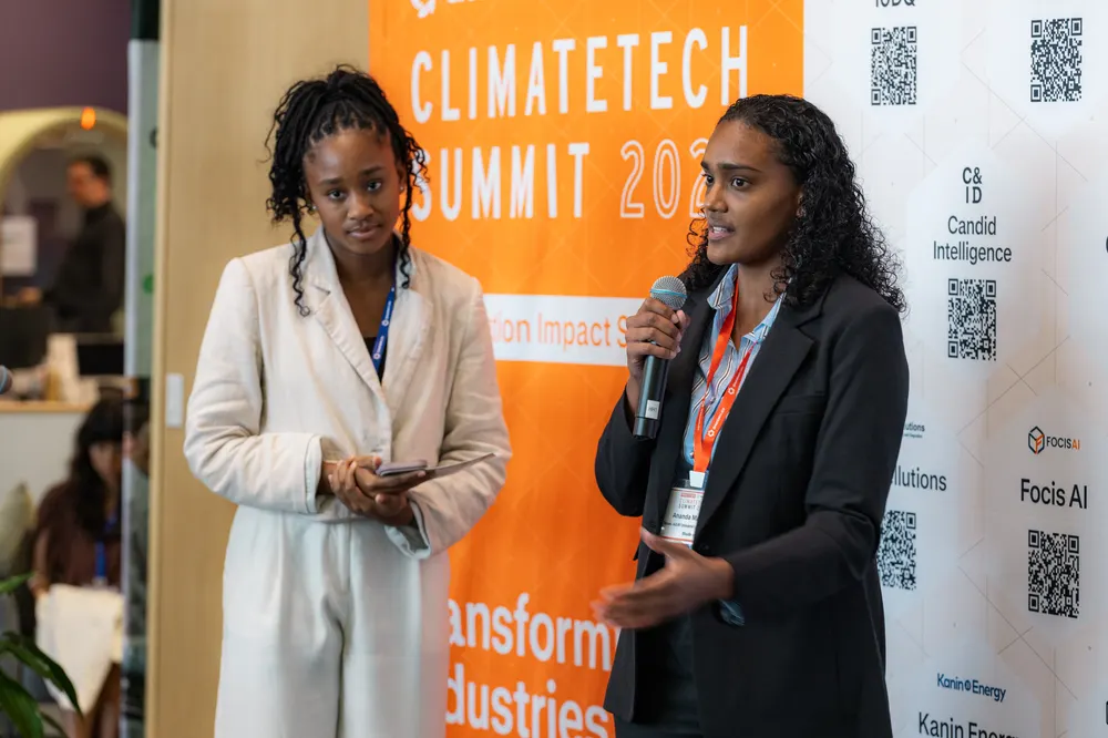 Ananda Maharaj, TEX-E Fellow and founder of Earthquake Harvest, speaks with attendees