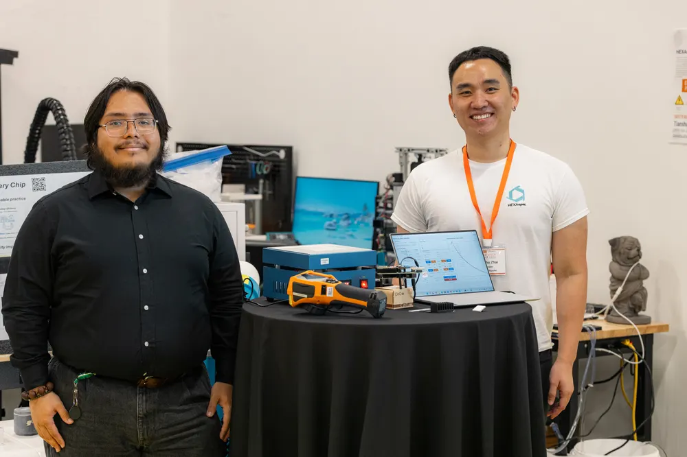 The HEXAspec team at their Open House exhibitor table