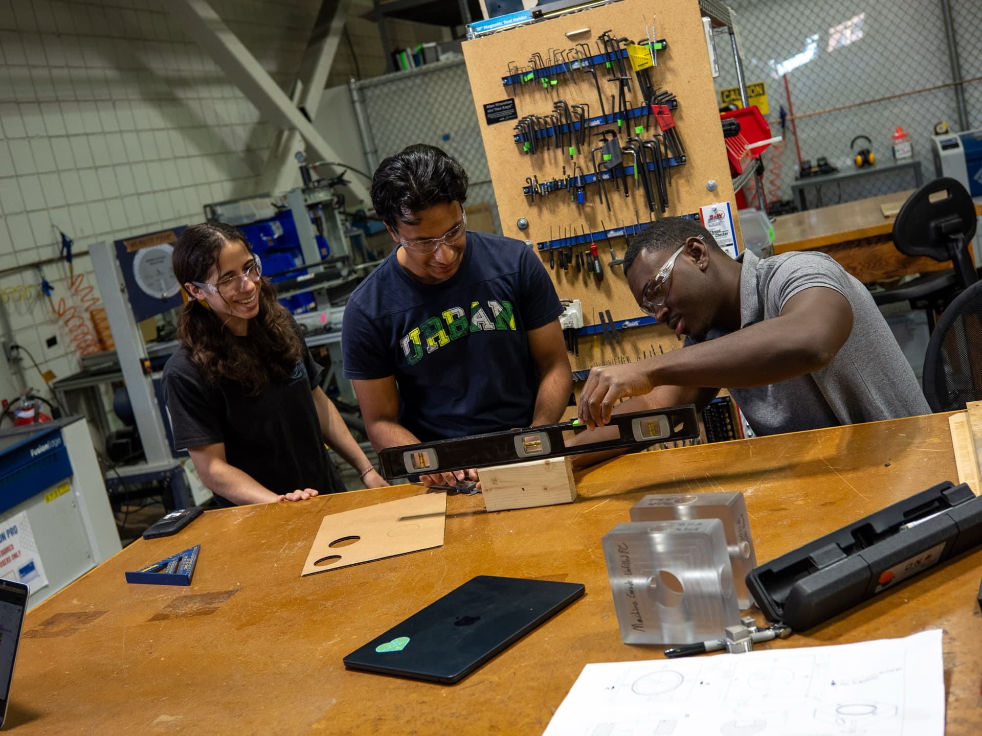 Greentown Labs entrepreneurs working on a hardware prototype in the machine shop
