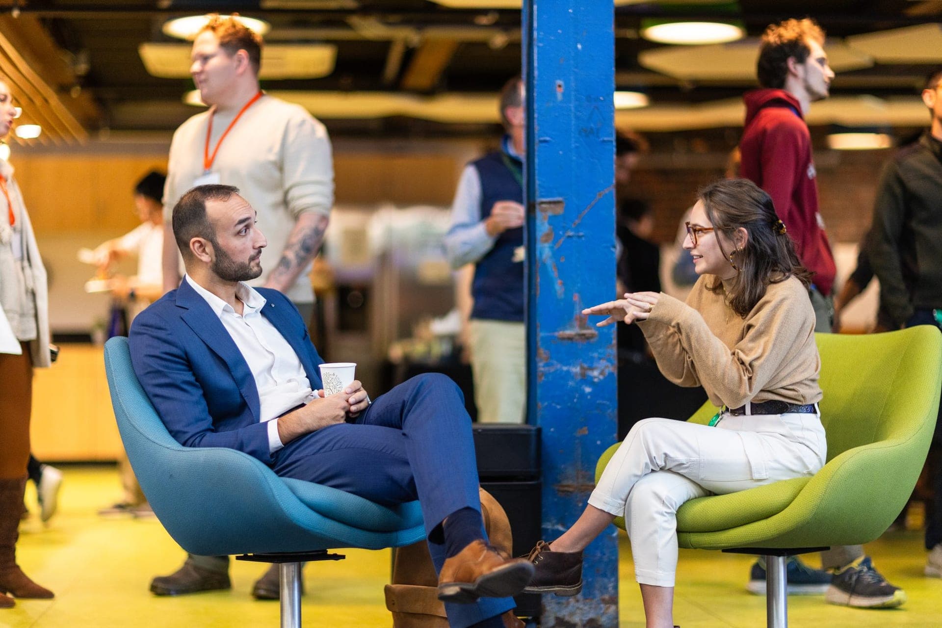 Two founders in conversation at a Greentown Labs networking event